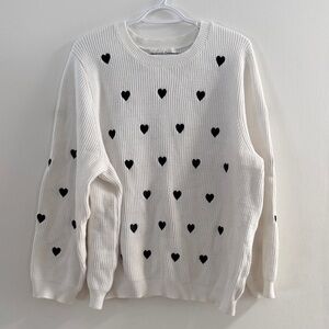 Chelsea & Theodore Cream Sweater with Black Heart Design
